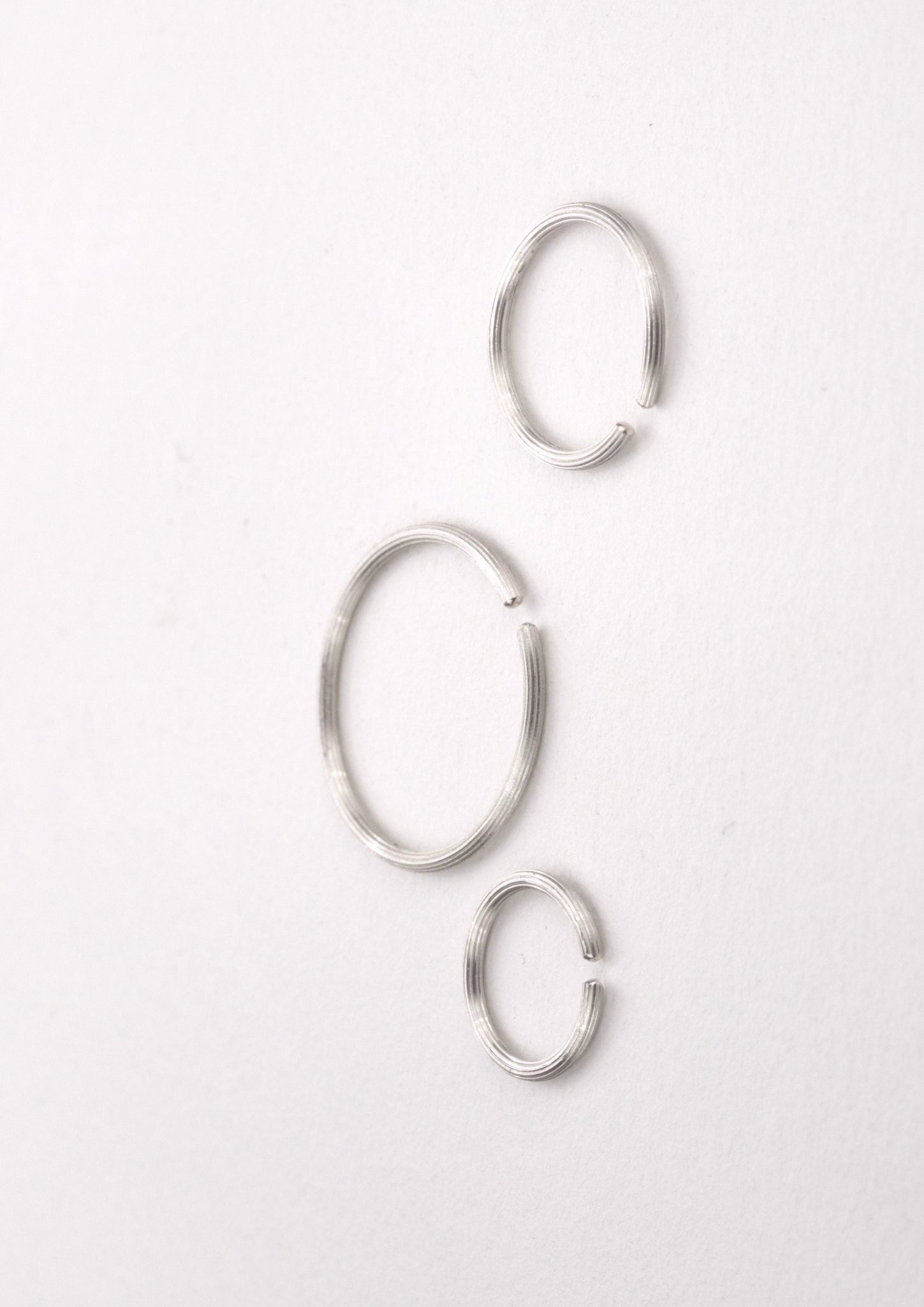 'BASIC NEEDS' Hoops, Fairtrade sterling silver